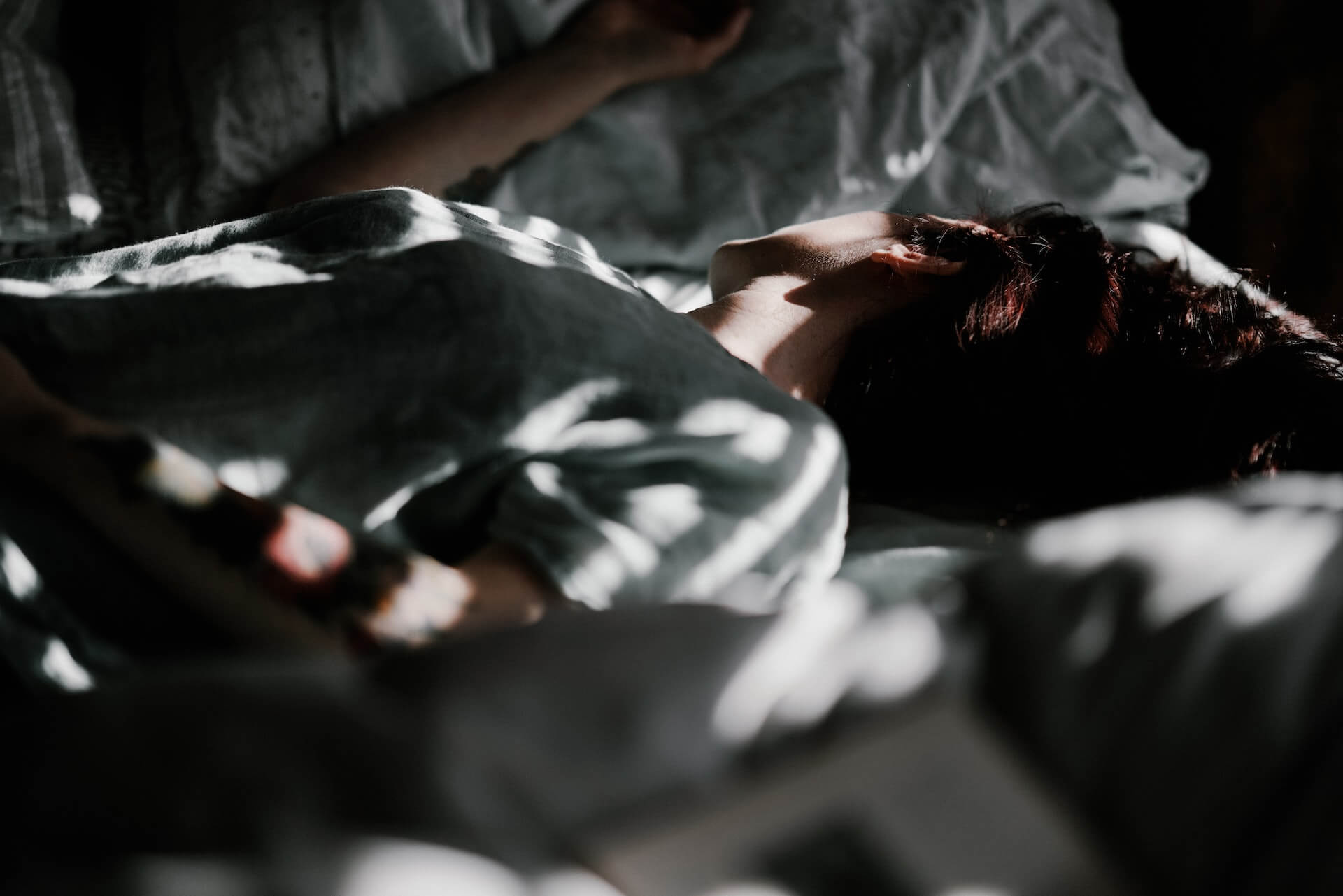 A woman lying in bed